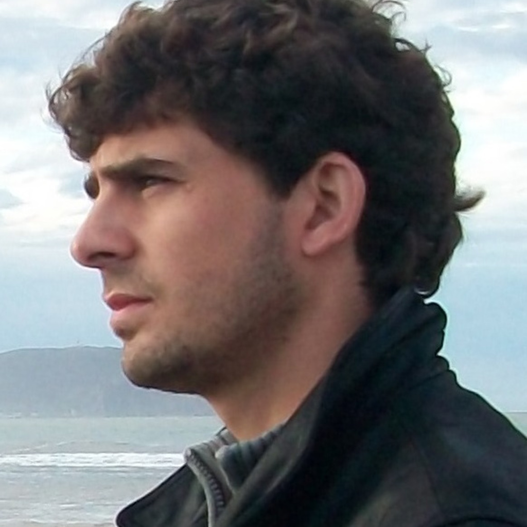 Profile headshot of a young man