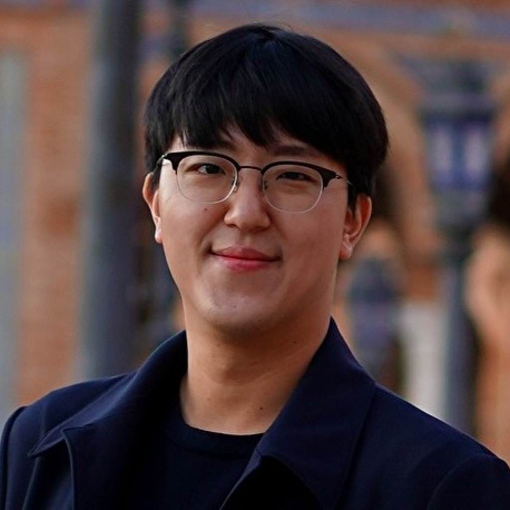 Professional headshot of a young man